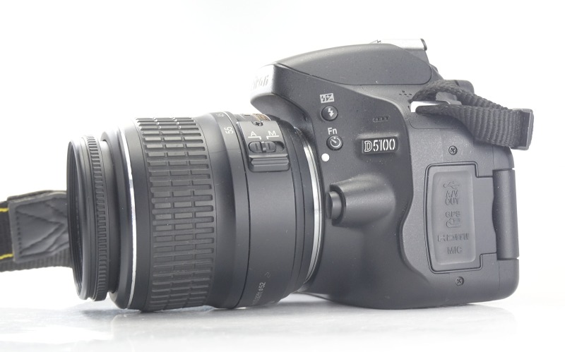 Nikon D5100 + 18-55mm